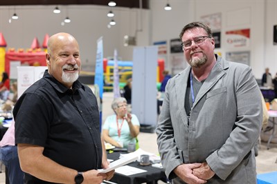 Councillor Nelson standing next to a citizen